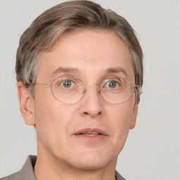 Neutral white middle-aged male with short  brown hair and grey eyes