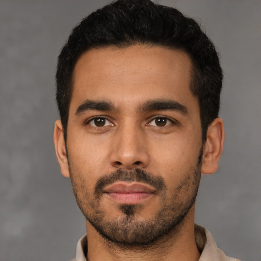 Neutral latino young-adult male with short  black hair and brown eyes