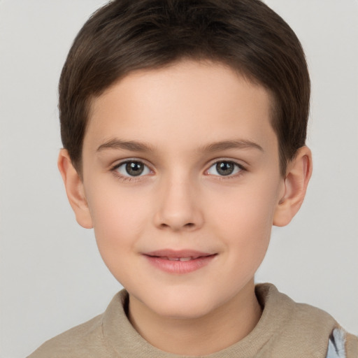 Joyful white child female with short  brown hair and brown eyes