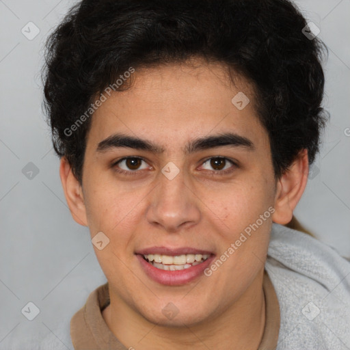 Joyful latino young-adult male with short  brown hair and brown eyes