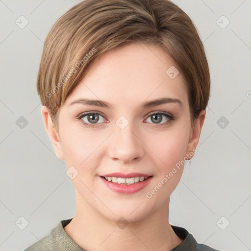 Joyful white young-adult female with short  brown hair and grey eyes