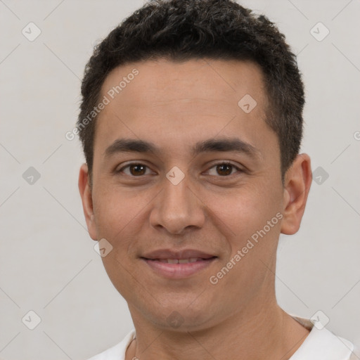 Joyful white young-adult male with short  brown hair and brown eyes