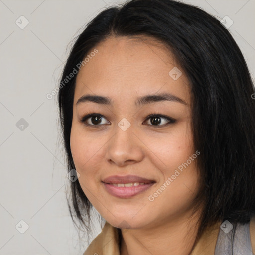 Joyful asian young-adult female with medium  black hair and brown eyes