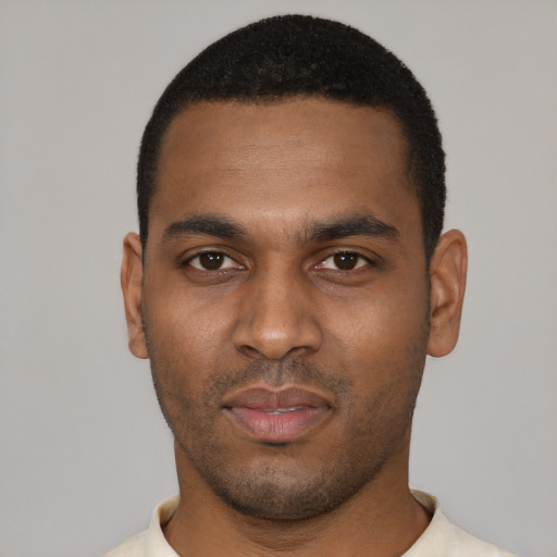 Neutral black young-adult male with short  black hair and brown eyes