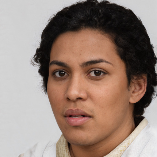 Neutral latino young-adult female with short  black hair and brown eyes