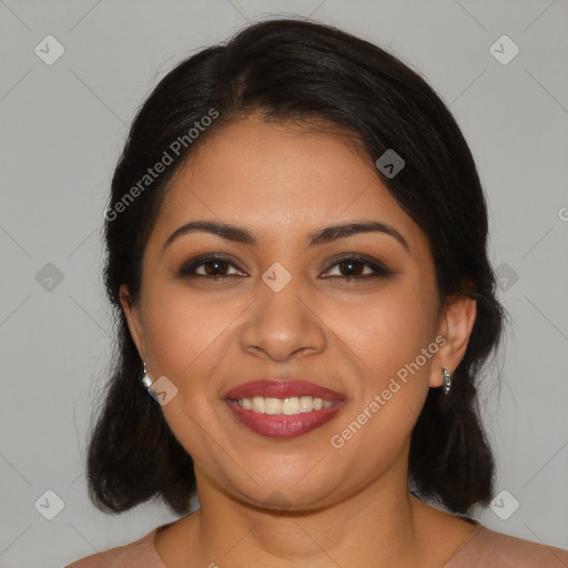 Joyful latino young-adult female with medium  brown hair and brown eyes