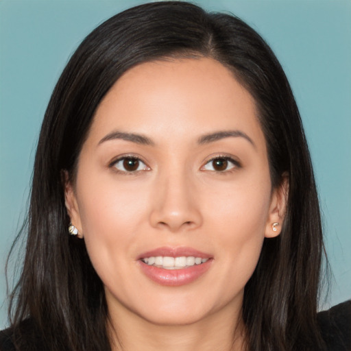 Joyful asian young-adult female with long  brown hair and brown eyes