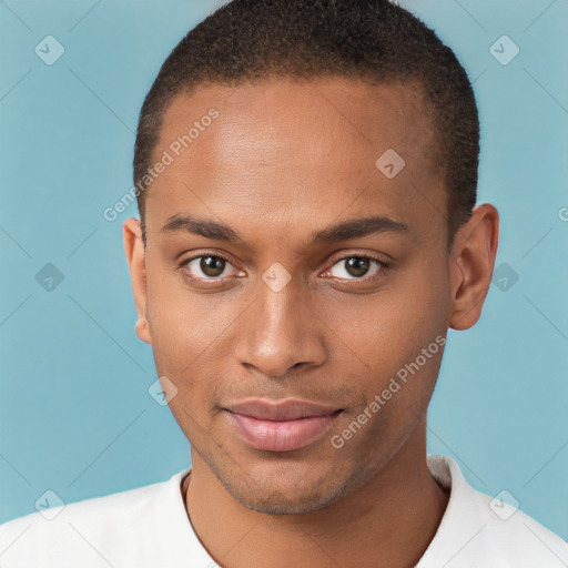 Joyful black young-adult male with short  brown hair and brown eyes