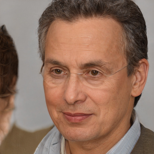 Joyful white middle-aged male with short  brown hair and brown eyes