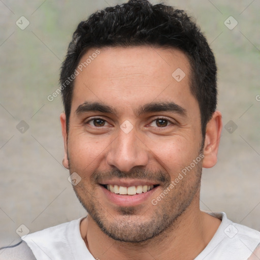 Joyful white young-adult male with short  black hair and brown eyes