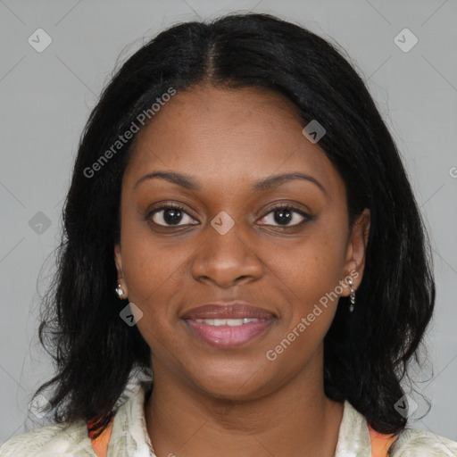 Joyful black young-adult female with medium  brown hair and brown eyes