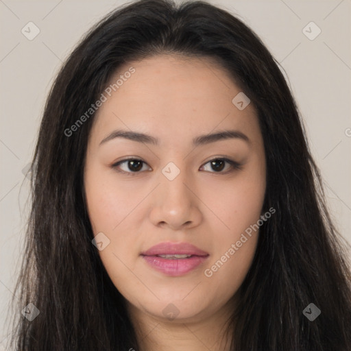 Joyful asian young-adult female with long  brown hair and brown eyes