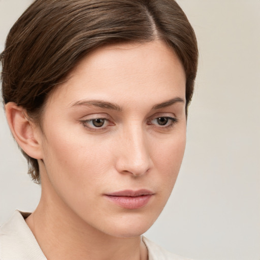 Neutral white young-adult female with medium  brown hair and grey eyes