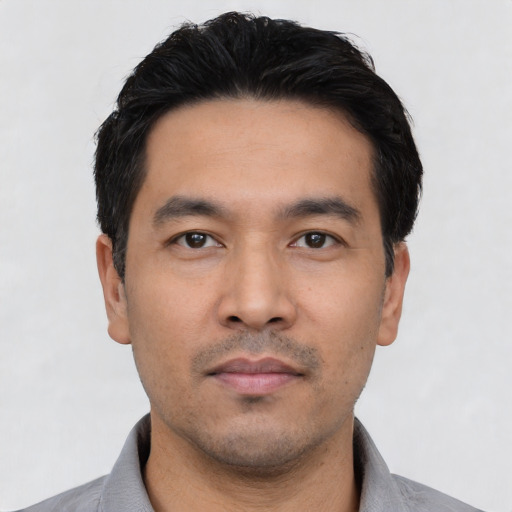 Neutral asian young-adult male with short  black hair and brown eyes
