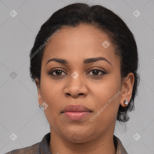 Joyful black young-adult female with medium  brown hair and brown eyes