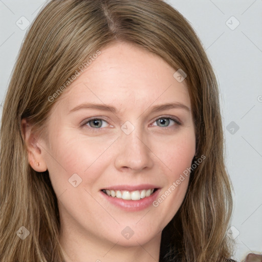 Joyful white young-adult female with long  brown hair and grey eyes