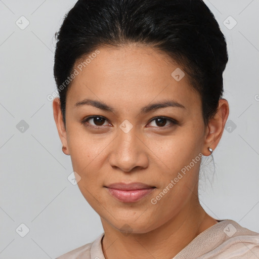 Joyful latino young-adult female with short  brown hair and brown eyes