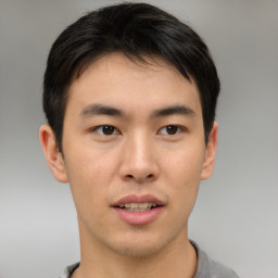 Neutral asian young-adult male with short  brown hair and brown eyes