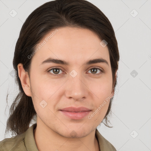 Joyful white young-adult female with medium  brown hair and brown eyes