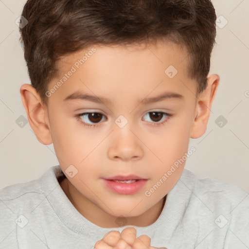 Joyful white child male with short  brown hair and brown eyes