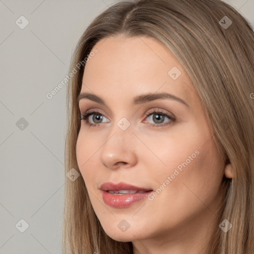 Neutral white young-adult female with long  brown hair and brown eyes