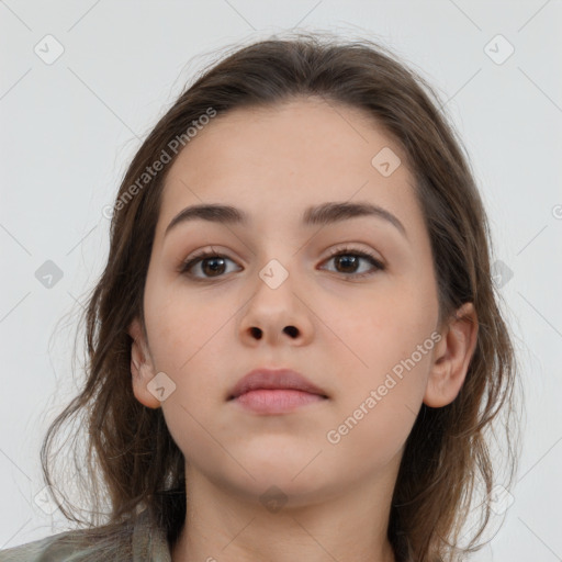 Neutral white young-adult female with long  brown hair and brown eyes