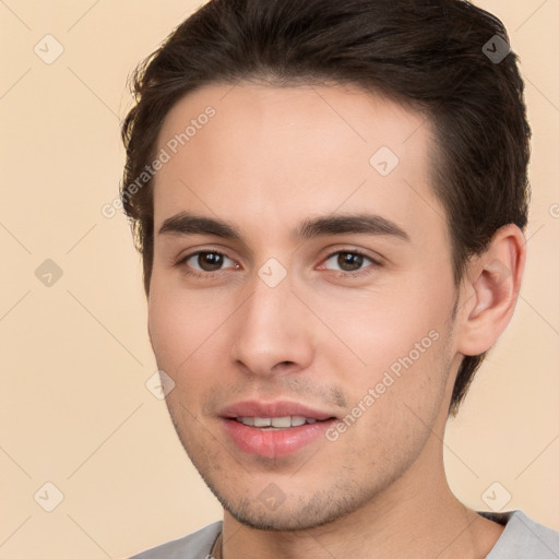 Joyful white young-adult male with short  brown hair and brown eyes