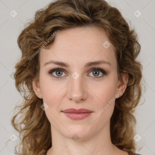 Joyful white young-adult female with medium  brown hair and green eyes