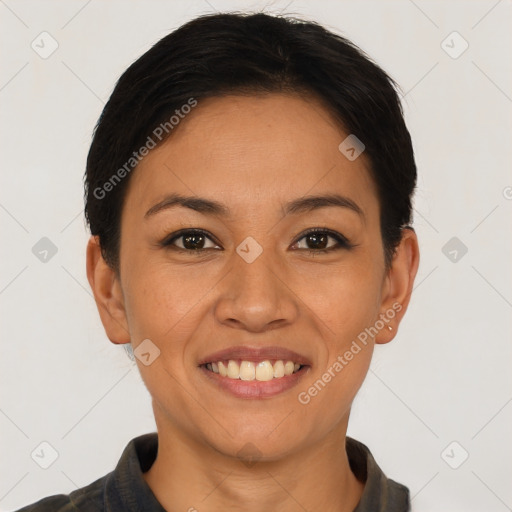 Joyful asian young-adult female with short  brown hair and brown eyes