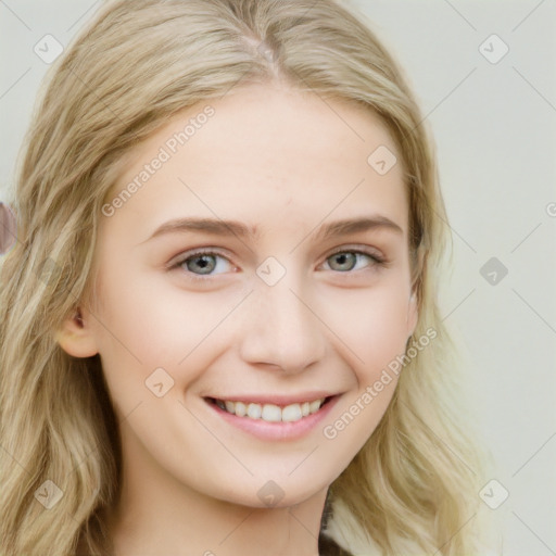 Joyful white young-adult female with long  brown hair and blue eyes