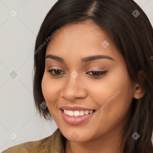 Joyful white young-adult female with long  brown hair and brown eyes