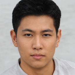 Neutral asian young-adult male with short  brown hair and brown eyes