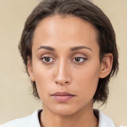 Neutral white young-adult female with medium  brown hair and brown eyes