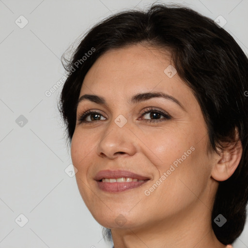 Joyful white young-adult female with medium  brown hair and brown eyes