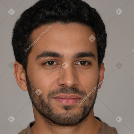 Neutral latino young-adult male with short  black hair and brown eyes