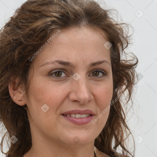 Joyful white adult female with long  brown hair and brown eyes