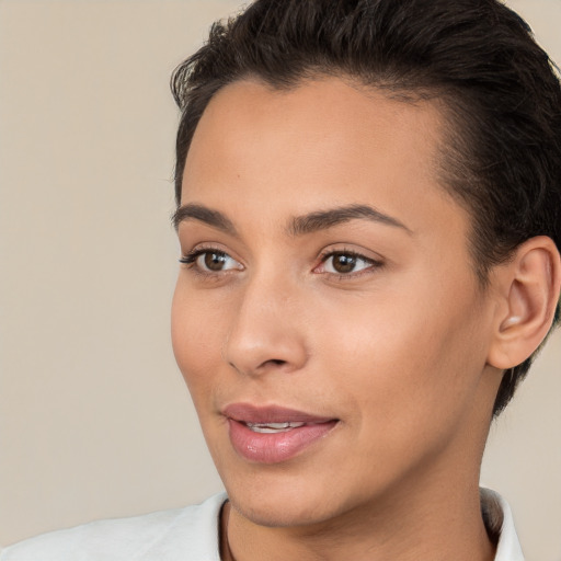 Joyful white young-adult female with short  brown hair and brown eyes