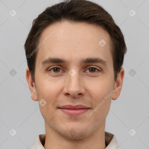 Joyful white young-adult male with short  brown hair and brown eyes