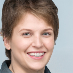 Joyful white young-adult female with short  brown hair and grey eyes