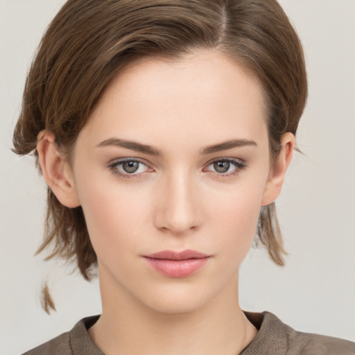 Neutral white young-adult female with medium  brown hair and brown eyes