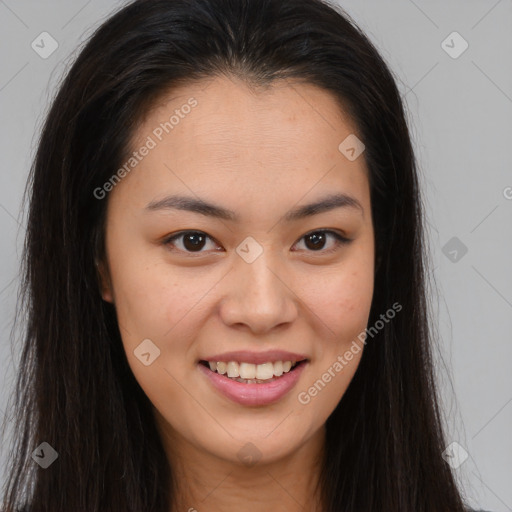 Joyful asian young-adult female with long  brown hair and brown eyes