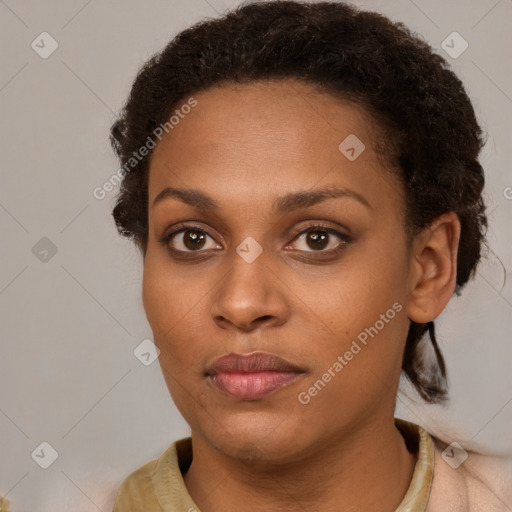 Neutral black young-adult female with short  brown hair and brown eyes