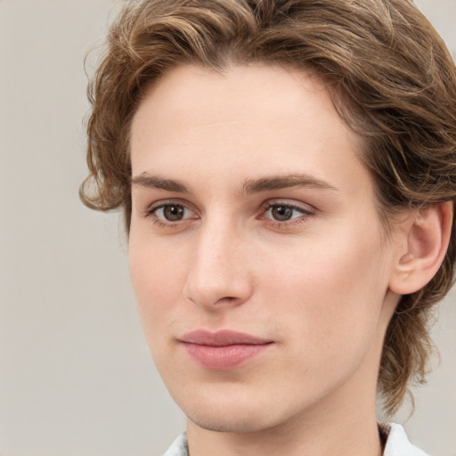 Joyful white young-adult female with medium  brown hair and green eyes