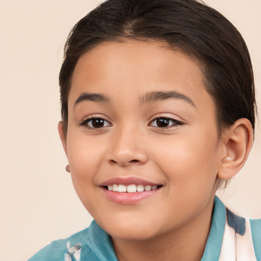 Joyful white child female with medium  brown hair and brown eyes