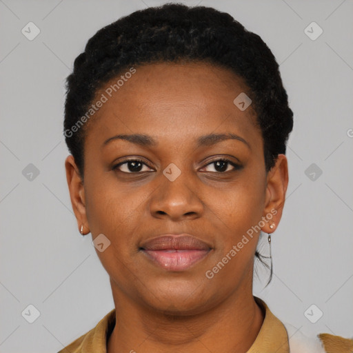 Joyful black young-adult female with short  black hair and brown eyes