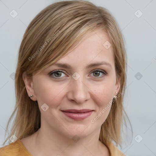 Joyful white young-adult female with medium  brown hair and blue eyes