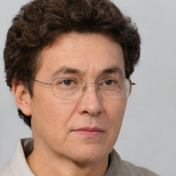 Neutral white middle-aged male with short  brown hair and brown eyes