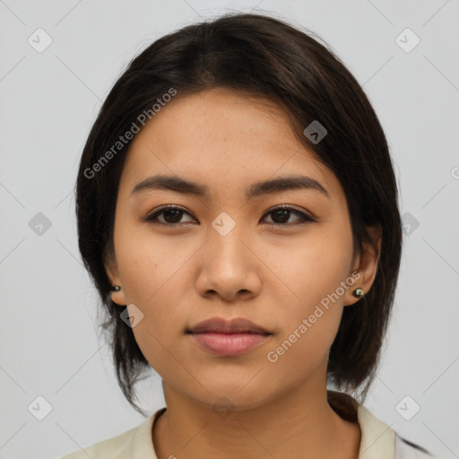 Neutral asian young-adult female with medium  brown hair and brown eyes