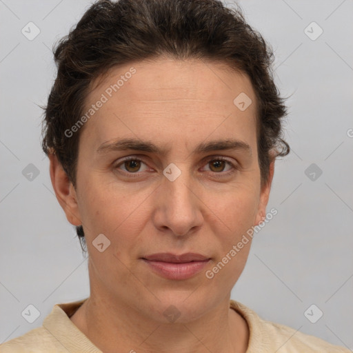 Joyful white adult female with short  brown hair and brown eyes