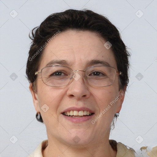 Joyful white adult female with short  brown hair and brown eyes